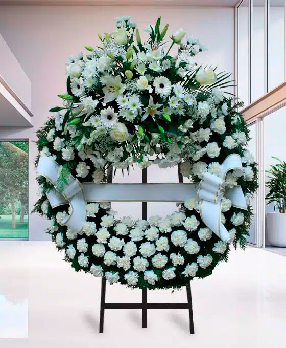 Corona Funeraria de claveles blancos para Santa Brígida
